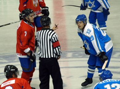 Serbia’s Marko Sretovic and Israel’s Daniel Mazour get ready to open the Olympic Qualification for Sochi 2014 at the tournament in Zagreb